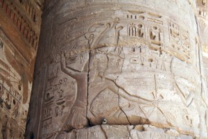 Medinet-Habu-atef-smiting-Egypt